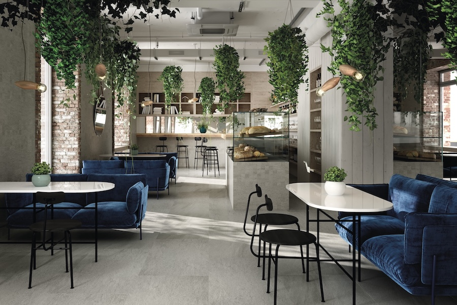 Moderní kavárna s dlažbou a obkladem Quarzite od FMG